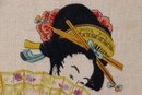 Two Wall Decor Pieces: Needlepoint Geisha And Embroidery Geisha