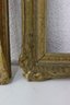 Two Ornate Faux Gilt Wooden Frames