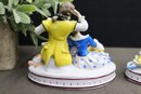 Two Vintage Hand-Painted Porcelain Courting Couple And Dog Figurines