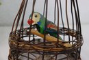 Vintage Bird In Wicker Cage