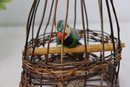 Vintage Bird In Wicker Cage