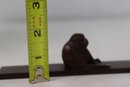 Bronze Chimpanzee Figurine On Plank