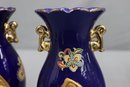 A Pair Of Intense Cobalt Blue And Gold Urn Vases