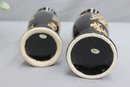 Two Black And Gold Balustrade Vases
