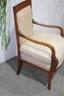 Two Neoclassical Style Armchairs With Exotic With Carvings Along Sinuous Arms