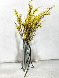 Modern Art Glass Vase On A Iron Base With Artificial Forsythia Branches