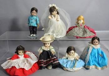 Collection Of Seven  Madame Alexander International Themed  Dolls- ( Hard Vinyl Heads )