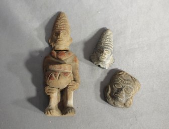 Collection Of Ancient Style Clay Figurines And Heads