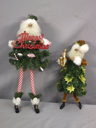 Two Santa Claus In Pine Needles Decorative Figurines, Dept. 56 & RAZ Imports