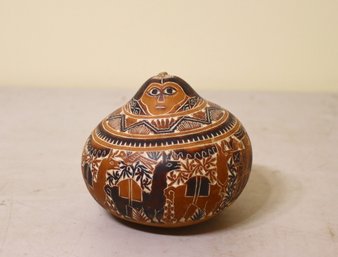 Etched And Colored Natural Gourd With Imagery Of Animals And Person On Top
