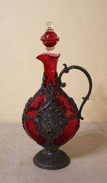 Renaissance Style Pewter And Ruby Glass Ornate Pedestal Pitcher