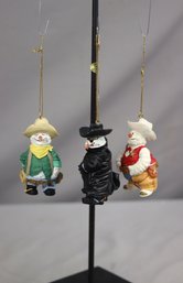 Trio Of Painted Western Themed Character Ornaments: The Sheriff, The Cowboy, And The Scoundrel