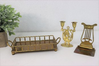 Group Lot Of Brass Mini Music Stand, Candlestick, And Small Gallery Rail Tray