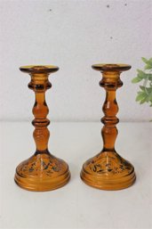 Two Vintage Amber Glass Taper Candlesticks