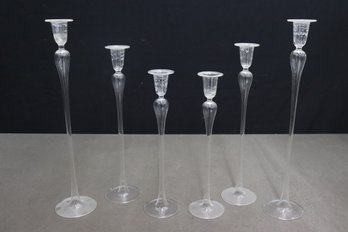 Set Of Six Stepped Size Clear Blown Glass Candlesticks