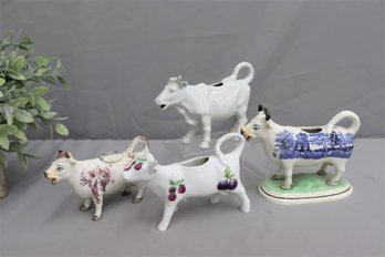 Group Lot Of 4 Decorated Cow Figurine Creamers (only 1 Has Lid)