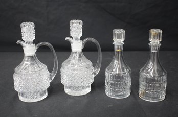 Set Of 4 Vintage Pressed Glass Decanters With Stoppers  Intricate Patterned Design