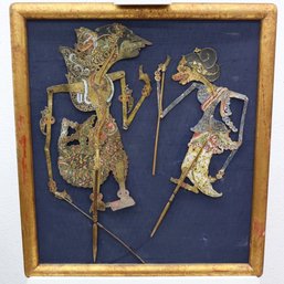 Pair Of Intricate Carved Hand-Painted Indonesian Shadow Puppets - Articulated And Framed On Blue Textile