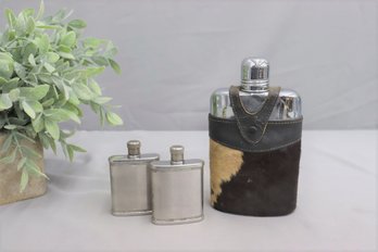 Group Lot Of 3 Vintage Flasks-One Has A Cowhide Cover