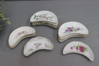 Group Lot Of Varied Fine China And Porcelain Floral Crescent Side Plates