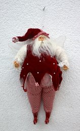 Figurine Of Santa Claus Working Undercover As Winged Fairy  (Curiosity About Charges On Rudolf's Credit Card)