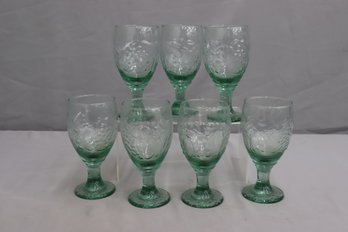 Group Of 7 Green Tint And Grape Bunch Textured Glass Goblets
