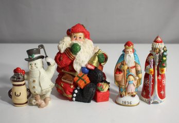 Assorted Christmas Figurine Set  Lenox Porcelain, Russian Hand Painted Santa, And More