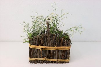 Arrangement Of Artificial Tiny White Daisies In Twig Cane-wrapped Container