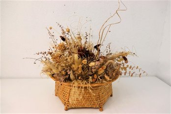 Arrangement Of Artificial Dried Grasses And Botanics In Wicker Pot