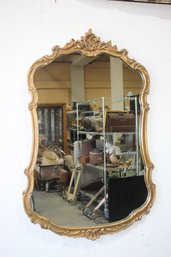 CARVED AND GILT WOODEN MIRROR