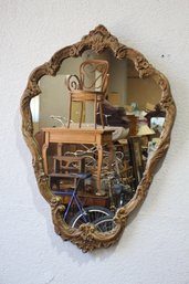 ITALIAN CARVED AND GILT WOODEN MIRROR