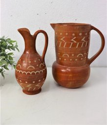Pair Of Clay Pitchers  With Etched Design