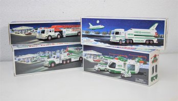 Group Of Four New Hess Fire Truck And Aviation Truck Sets - Original Boxes