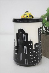 Taxi Cab Finial On Night Skyline Ceramic Column Canister, Our Name Is Mud Inc.