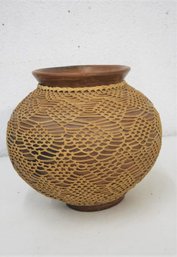 Vintage Pottery  Vase Wrapped With Woven Reed And Rattan  Small Chip On Bottom