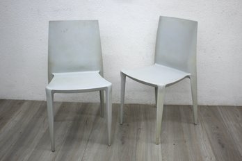 Pair Of BELLINI Plastic Stacking Chairs Made By Heller In The USA.