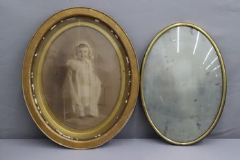 Pair Of Vintage Oval Frames -one With A Child Portrait