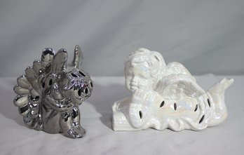 Two Pierced Angel Figurines - One White And One Metallic