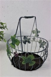 Welded Metal Wire Basket With Wicker Bottom And Applied Leaf And Berry