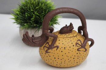 A Chinese Yixing Pottery Dragon Teapot