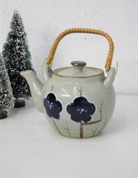Stoneware Teapot With Cane-wrapped Handle