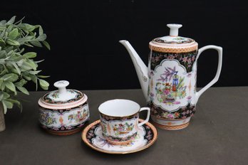 Hand-Painted Chinese Porcelain Tea Pot, Lidded Sugar, And Cup And Saucer