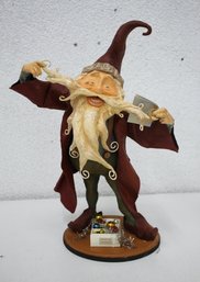 A Magical Hand Painted Resin And Fabric Santa With Glass Ornaments.
