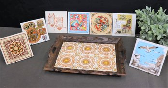 Collection Of Decorative Ceramic Wall Tiles, Trivets, And A Six Tile Tray