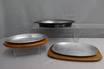 Group Of 3 MCM  Aluminum And Wood Sizzle Platters (2 Wood/1 Nordic Ware Composite))