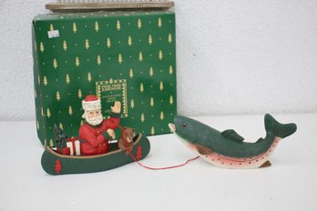 Midwest Pine Tree Lodge Santa In Canoe With Fish Figurine