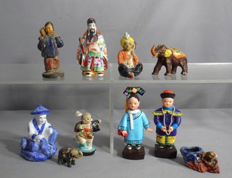 Eclectic Assortment Of Cultural Figurines
