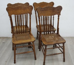 Set Of 4 Vintage Oak Chairs With Intricate Carved Details