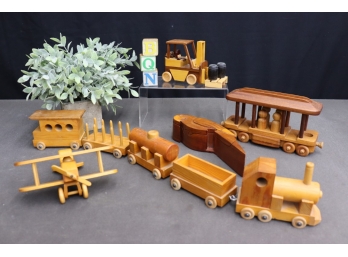 Planes, Traines, And A Parrot: Grouping Of Childs Wooden Block Toys