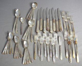 Stainless Elegance: A Partial Set Of Timeless Flatware